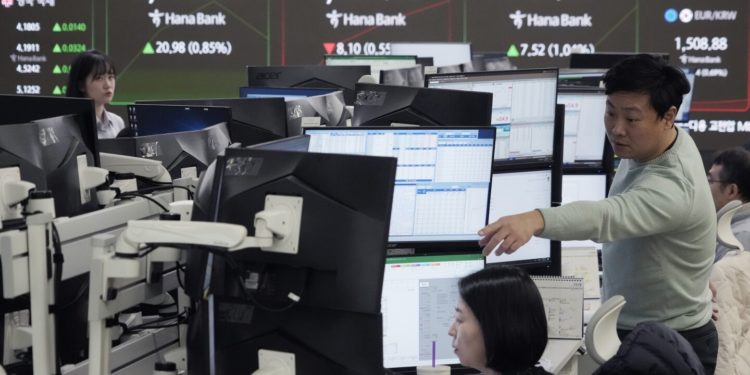 Stock Market Today Asia Shares Trade Mostly Lower As As Investors