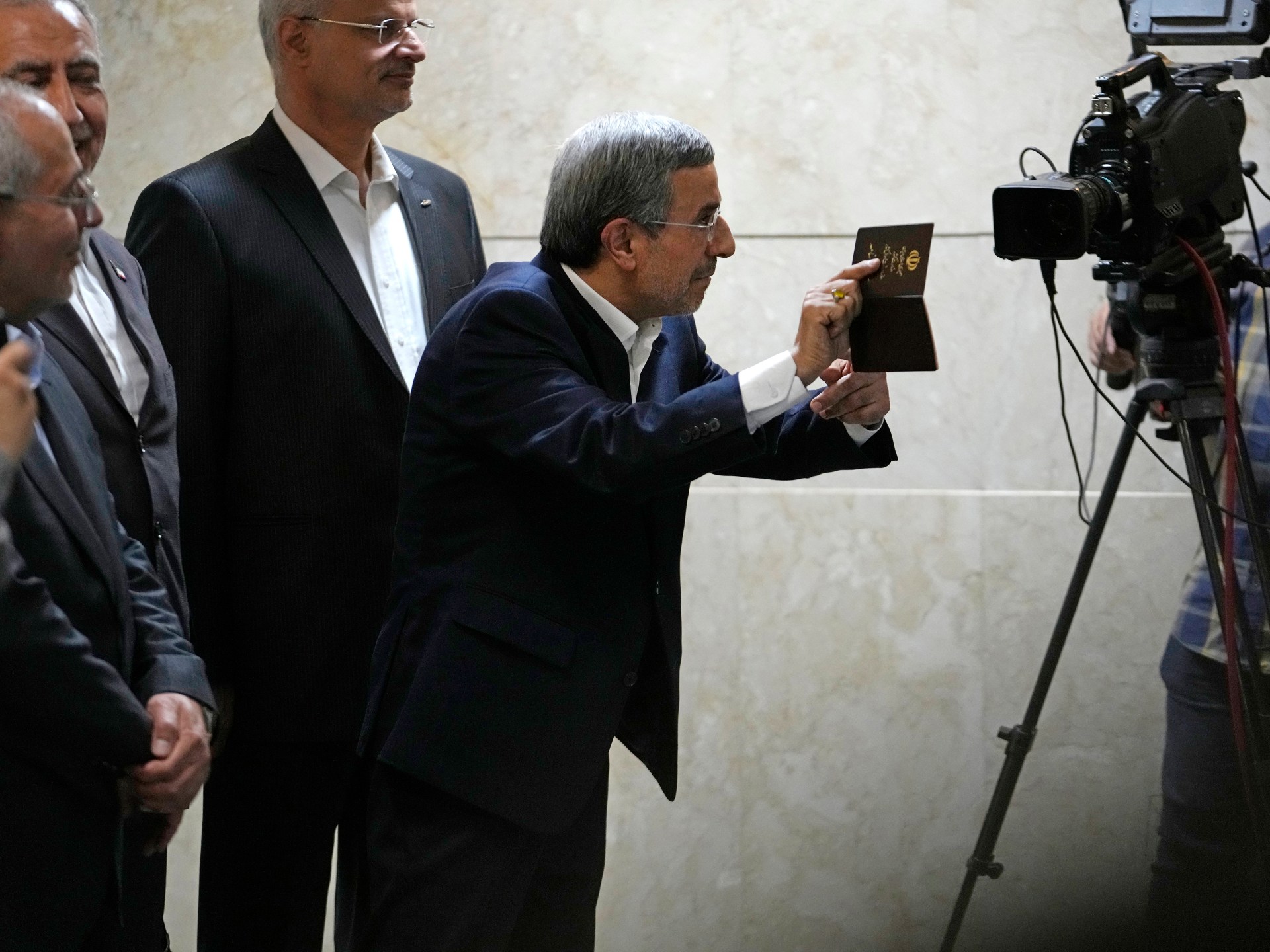 Iran’s expresident Ahmadinejad, disqualified Larijani sign up for