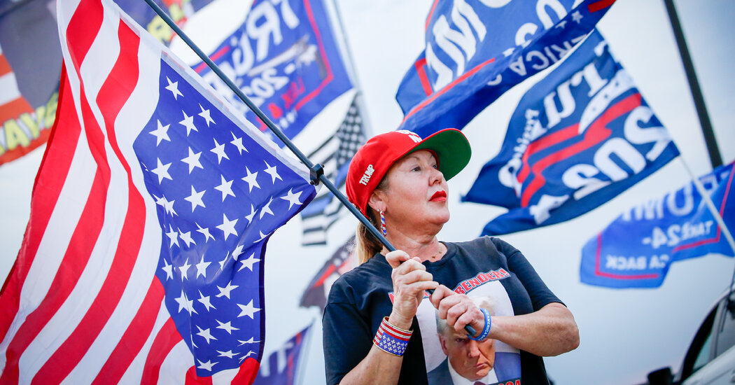 Trump Hawks American Flag Pins with His Name in Gold Splashed Across ...