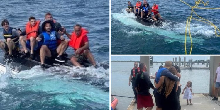 Coast Guard rescues five boaters clinging to overturned vessel in ...