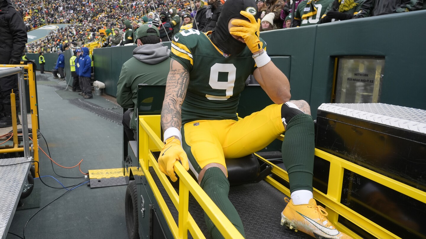 Packers Wr Christian Watson Carted Into Locker Room. Qb Jordan Love 