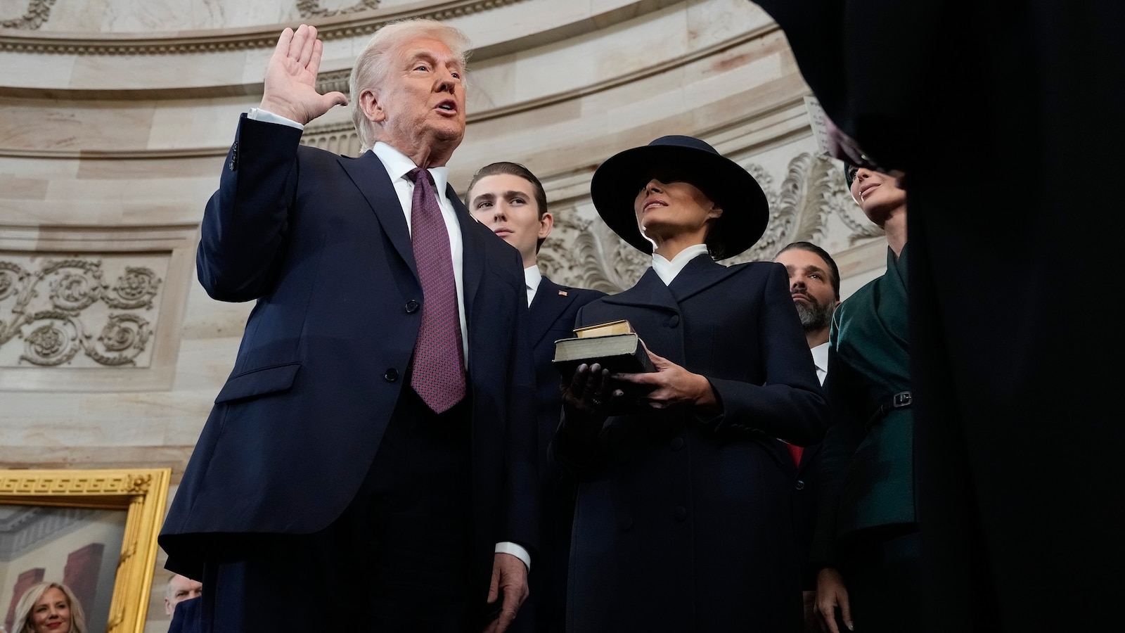 Without putting hand on Bible, Trump takes oath of office – DNyuz