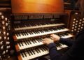 An Arkansas organist is playing 18 hours of Bach this year, one lunch break at a time