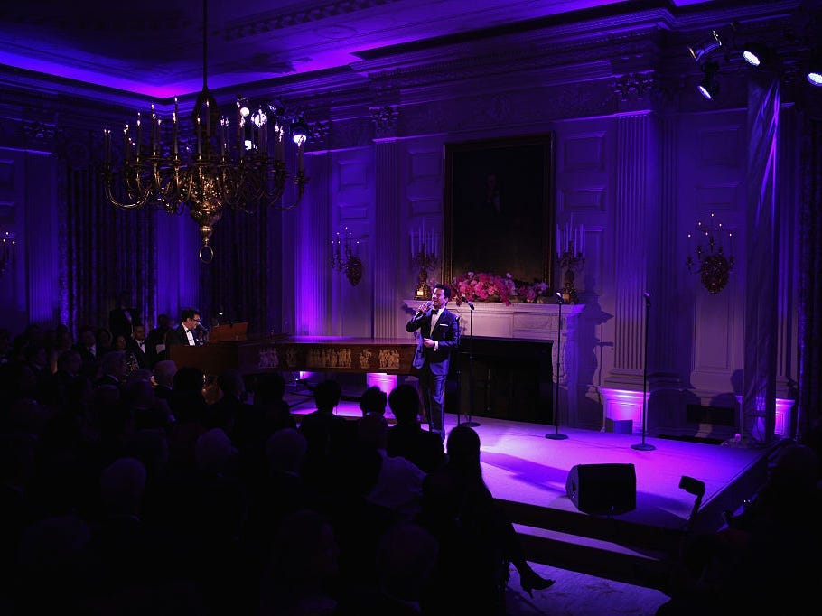 The State Dining Room in purple lighting in 2015.