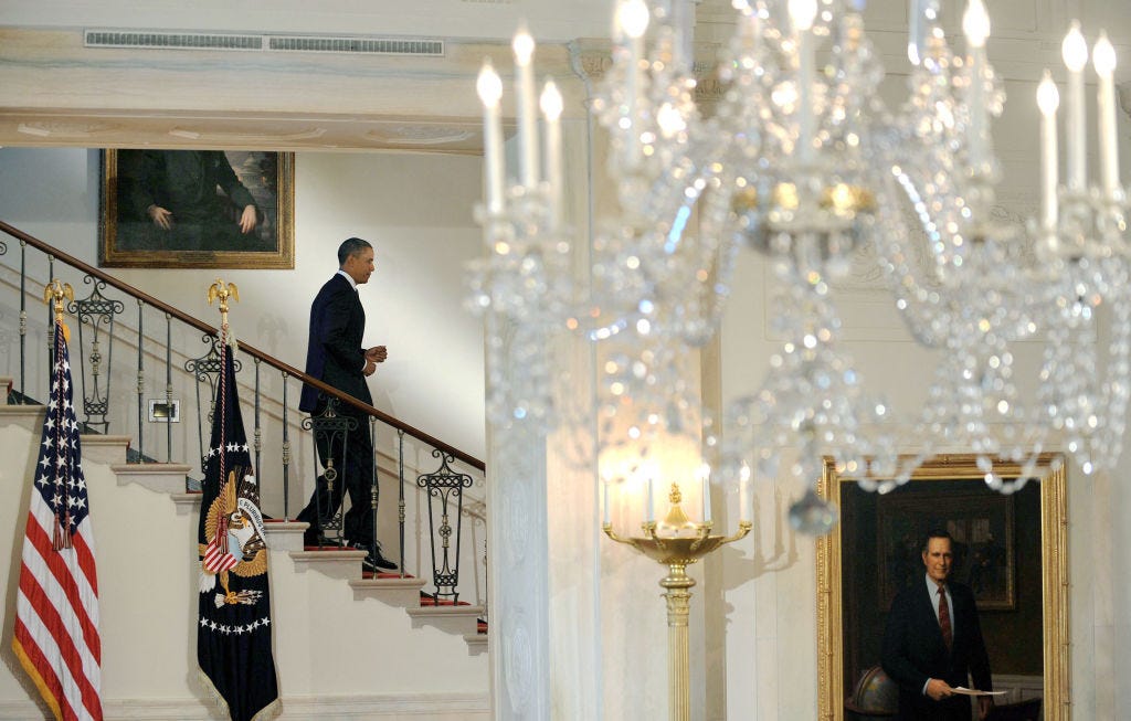 A portrait of George H.W. Bush at the Obama White House.