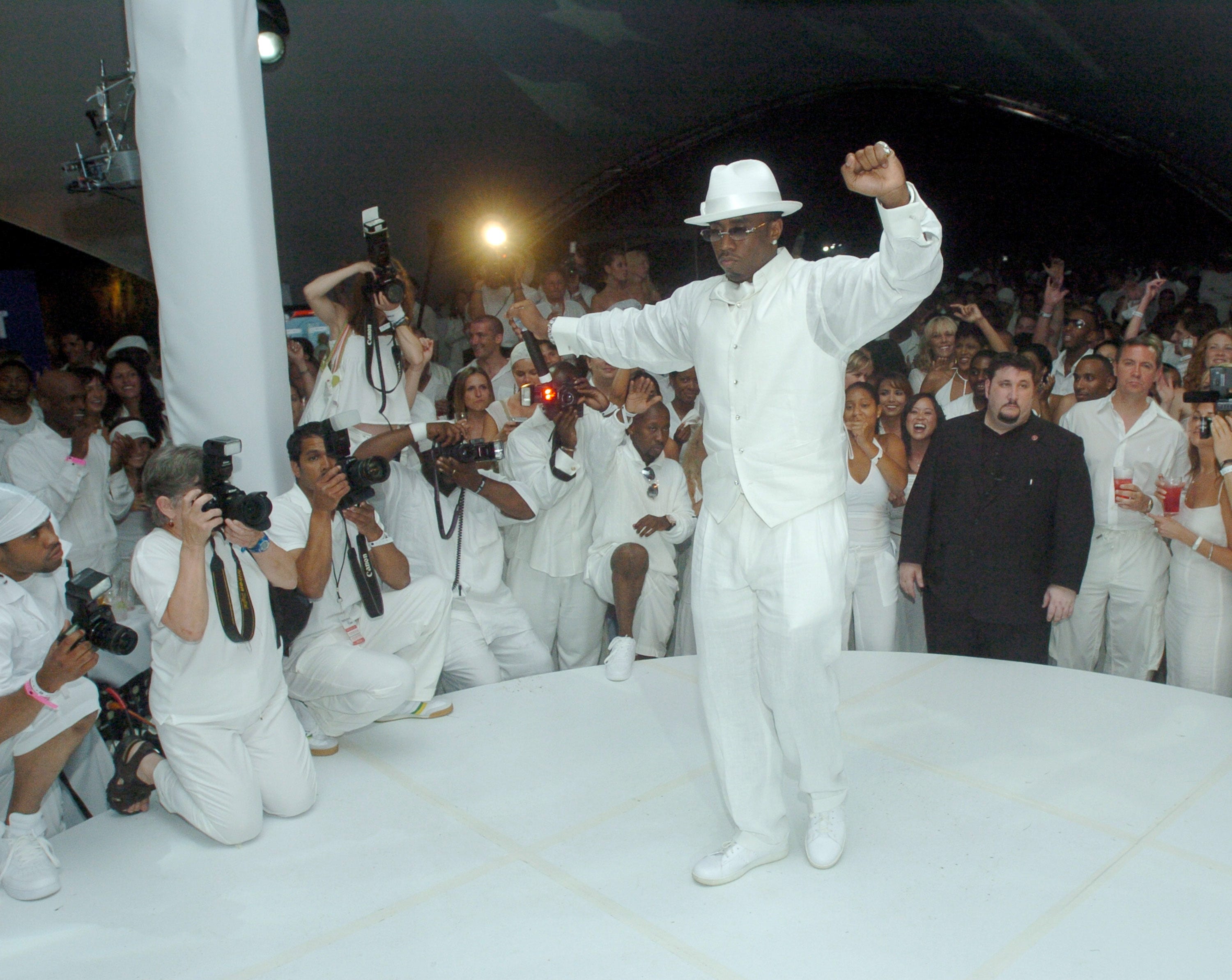 Diddy at his 2004 white party in the Hamptons.