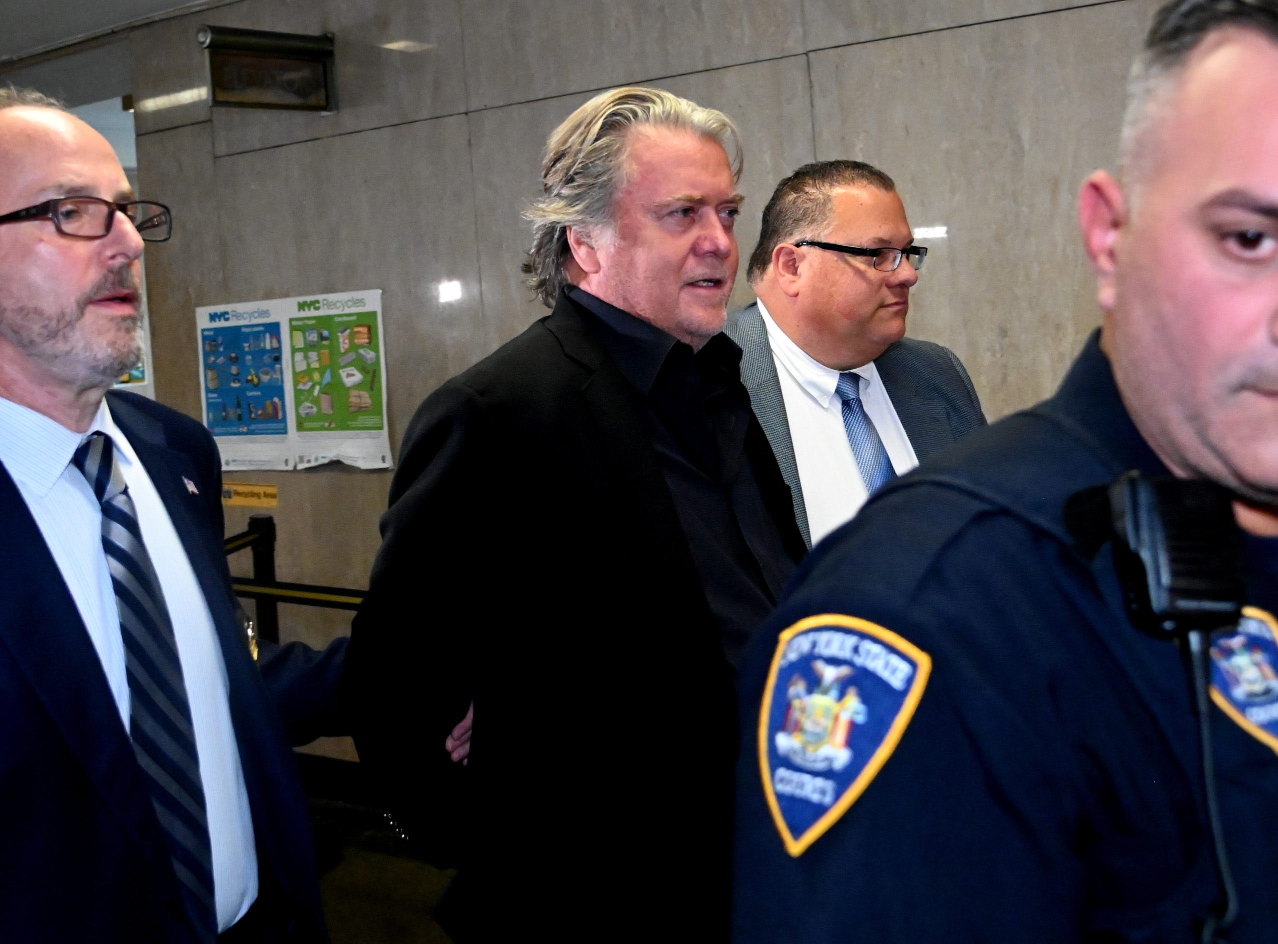 Steve Bannon escorted to courtroom