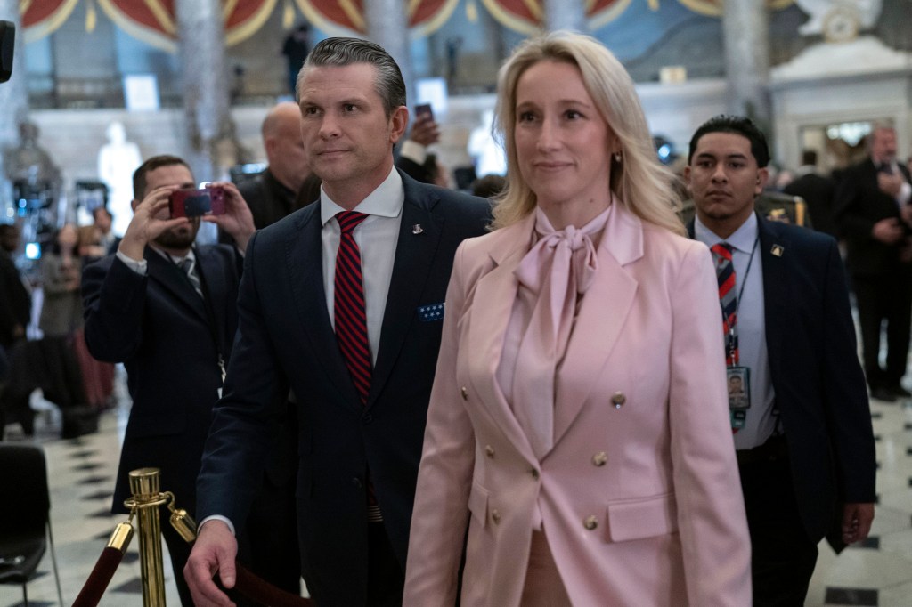 Secretary of Defense Pete Hegseth and his wife Jennifer Rauchet walk to the House Chamber before of President Donald Trump addresses to a joint session of Congress at the Capitol in Washington, Tuesday, March 4, 2025.
