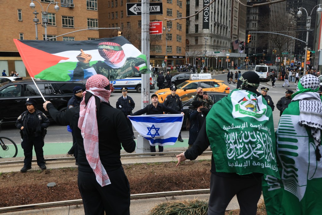 Pro-Israel demonstrators and pro-palestinian demonstrators face off after a protest for the release of Palestinian activist Mahmoud Khalil on March 15, 2025 in New York City.