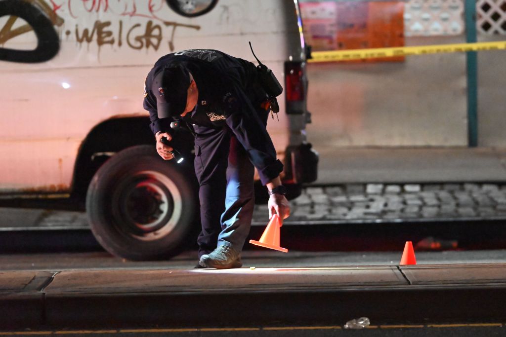Police at the scene of the shooting