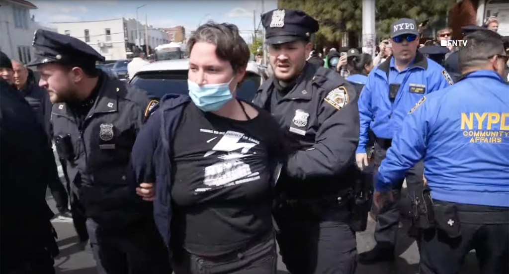 Protester arrested in Brooklyn.