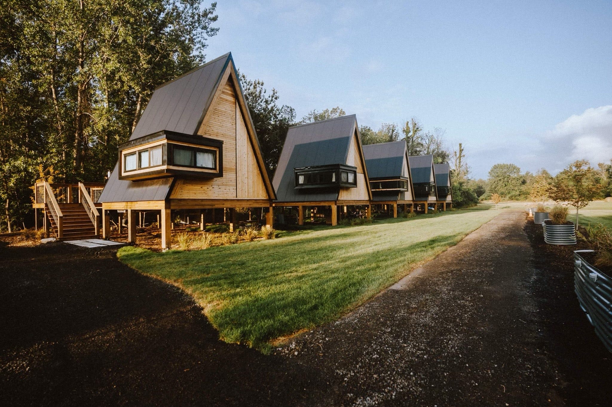 A row of A-frame cabins.