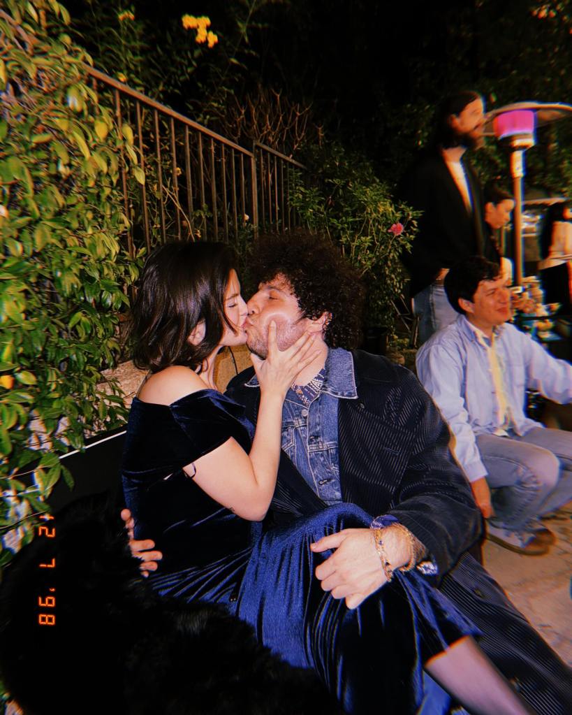 Benny Blanco and Selena Gomez kissing. 