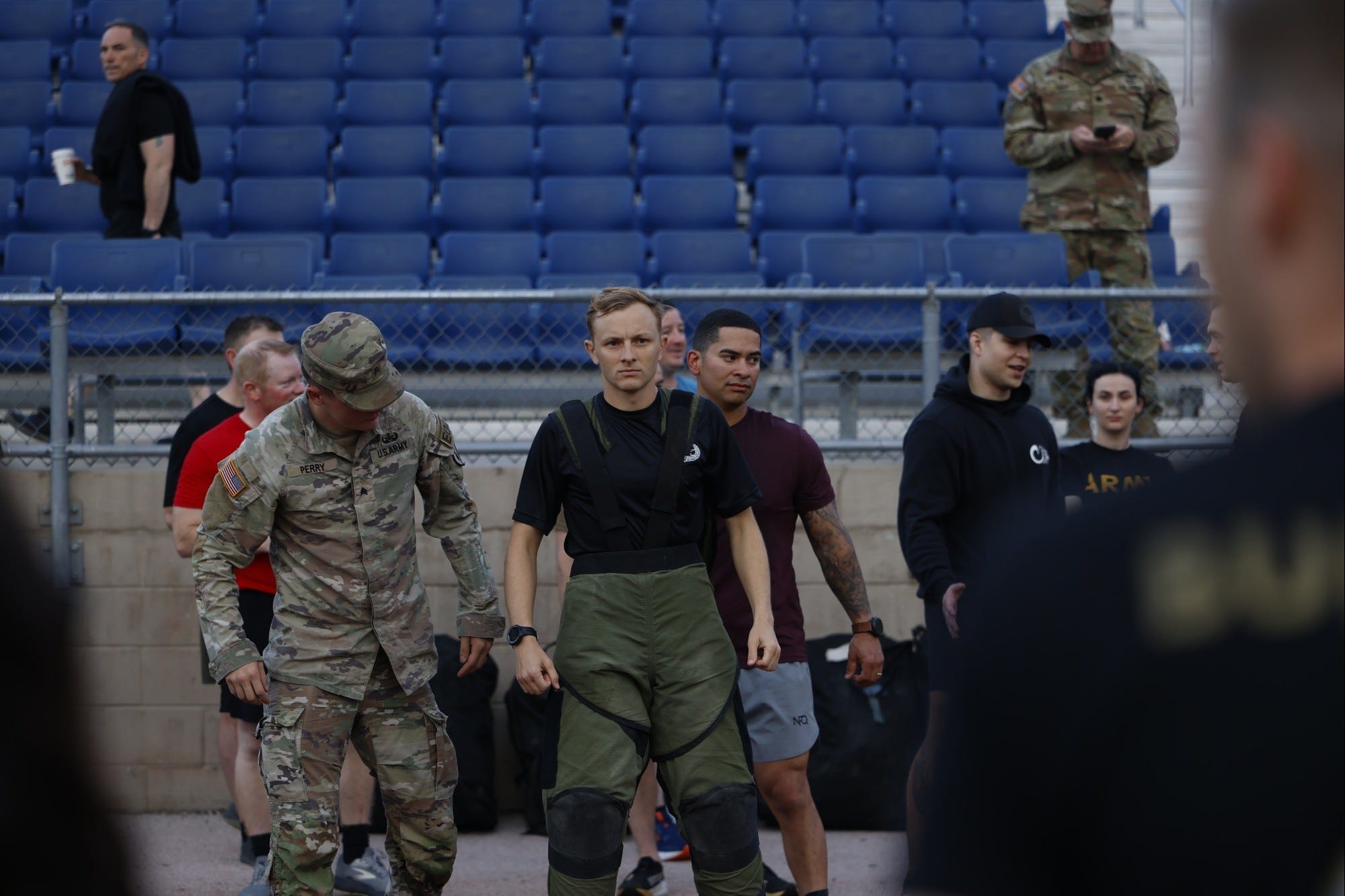 Capt. Travis Chewning-Kulick, commander of the 752nd Ordnance Company (Explosive Ordnance Company) prepares to attempt the Guinness World Record for fastest one mile run in a bomb suit at Phantom Warrior Stadium, Fort Cavazos Texas, April 25, 2025.
