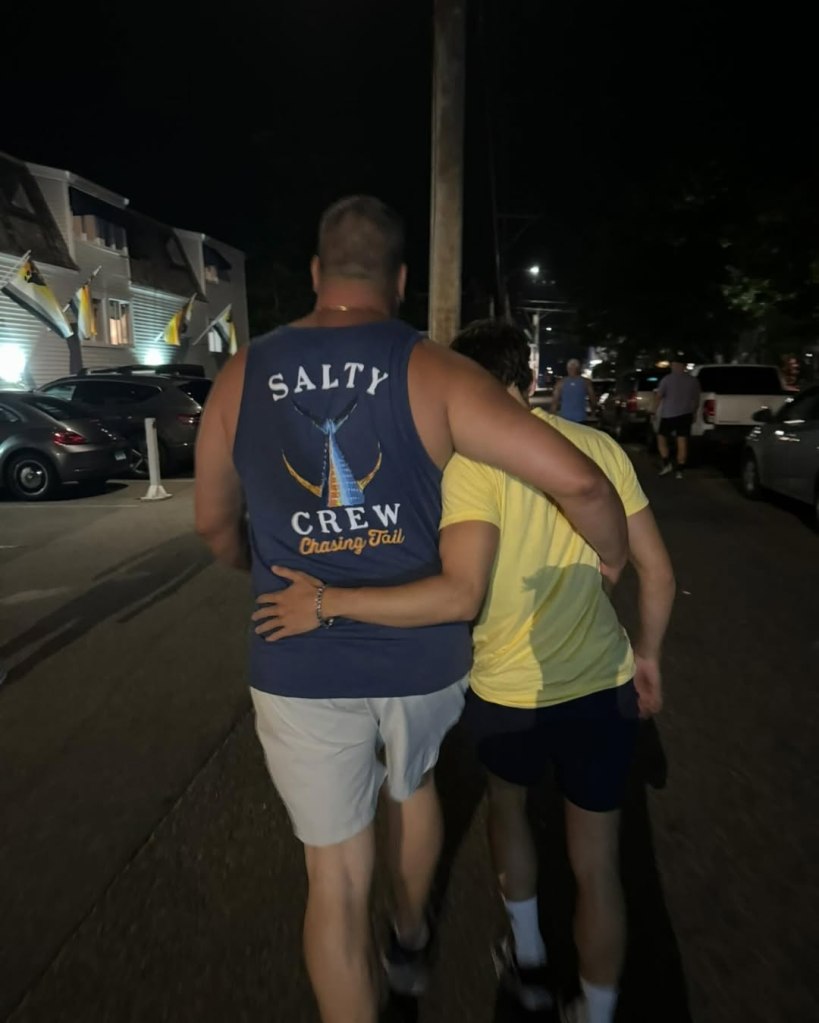 Bret LaBelle and Chris Stanley walk together.