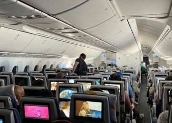 I sat in the front and back of economy for a round-trip long-haul flight. I’m still partial to the back.