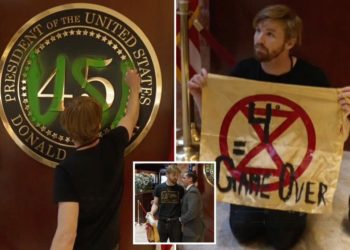 Climate protester arrested after spray painting over presidential insignia at Trump Tower