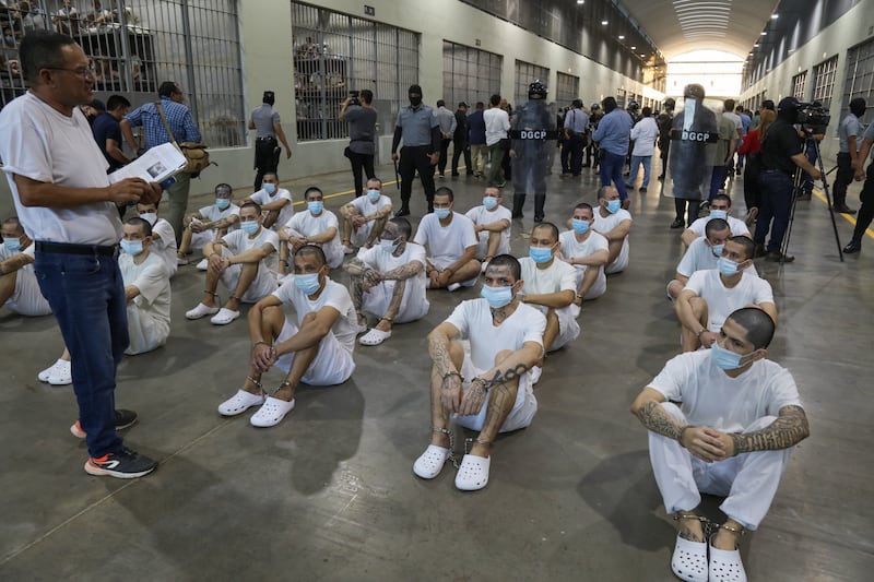 SAN VICENTE, EL SALVADOR - APRIL 4: Prisoners sit at maximum security penitentiary CECOT (Center for the Compulsory Housing of Terrorism) on April 4, 2025 in Tecoluca, San Vicente, El Salvador. Amid internal legal dispute, Trump's administration continues with its controversial and fast-paced deportation policy to El Salvador, as part of a partnership with President Bukele. The US Government acknowledged mistakenly deporting a Maryland resident from El Salvador with protected status and is arguing against returning him to the US. (Photo by Alex Peña/Getty Images)