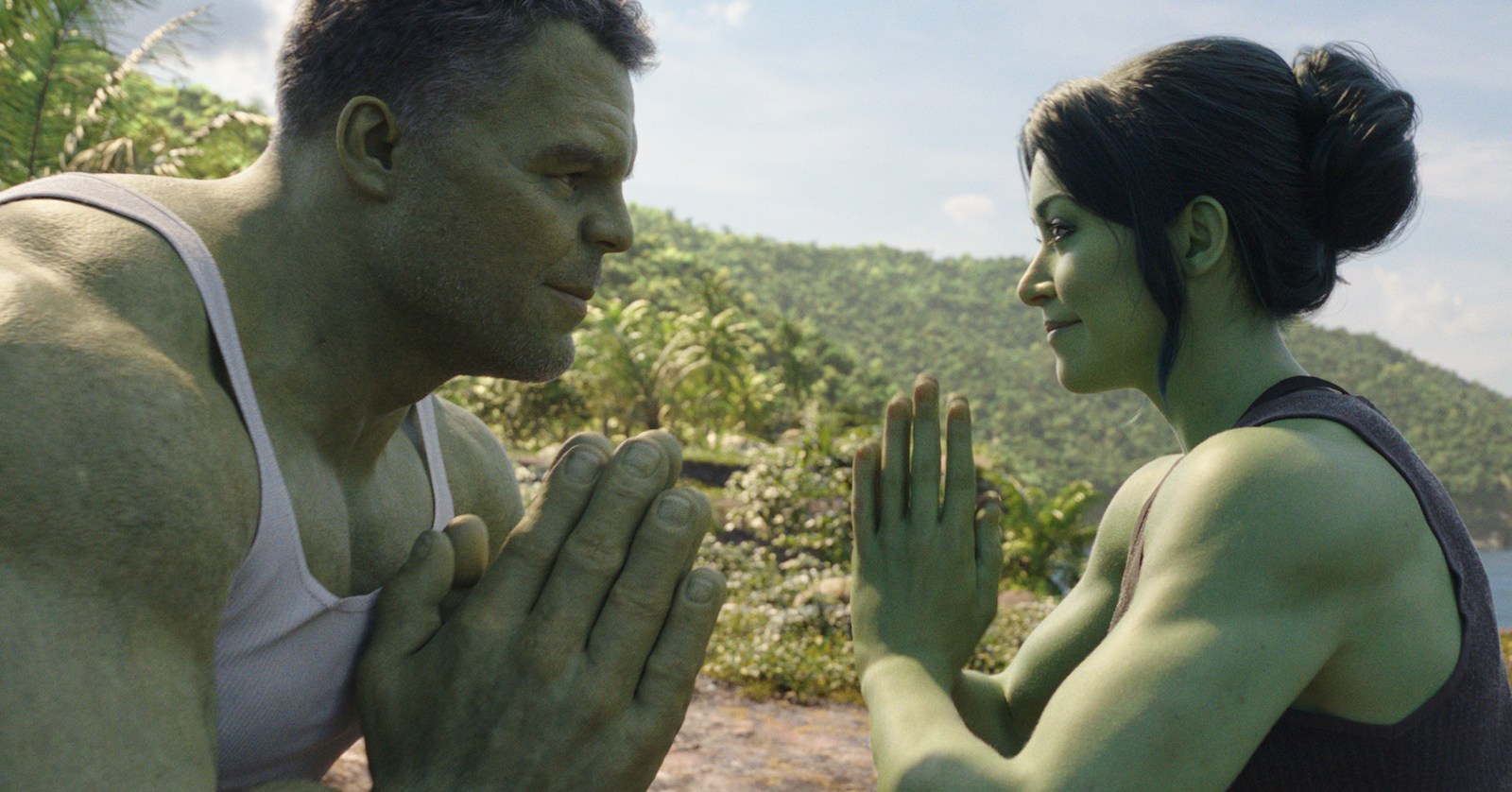 Hulk and She-Hulk bowing to each other with their hands in prayer position in She-Hulk: Attorney at Law