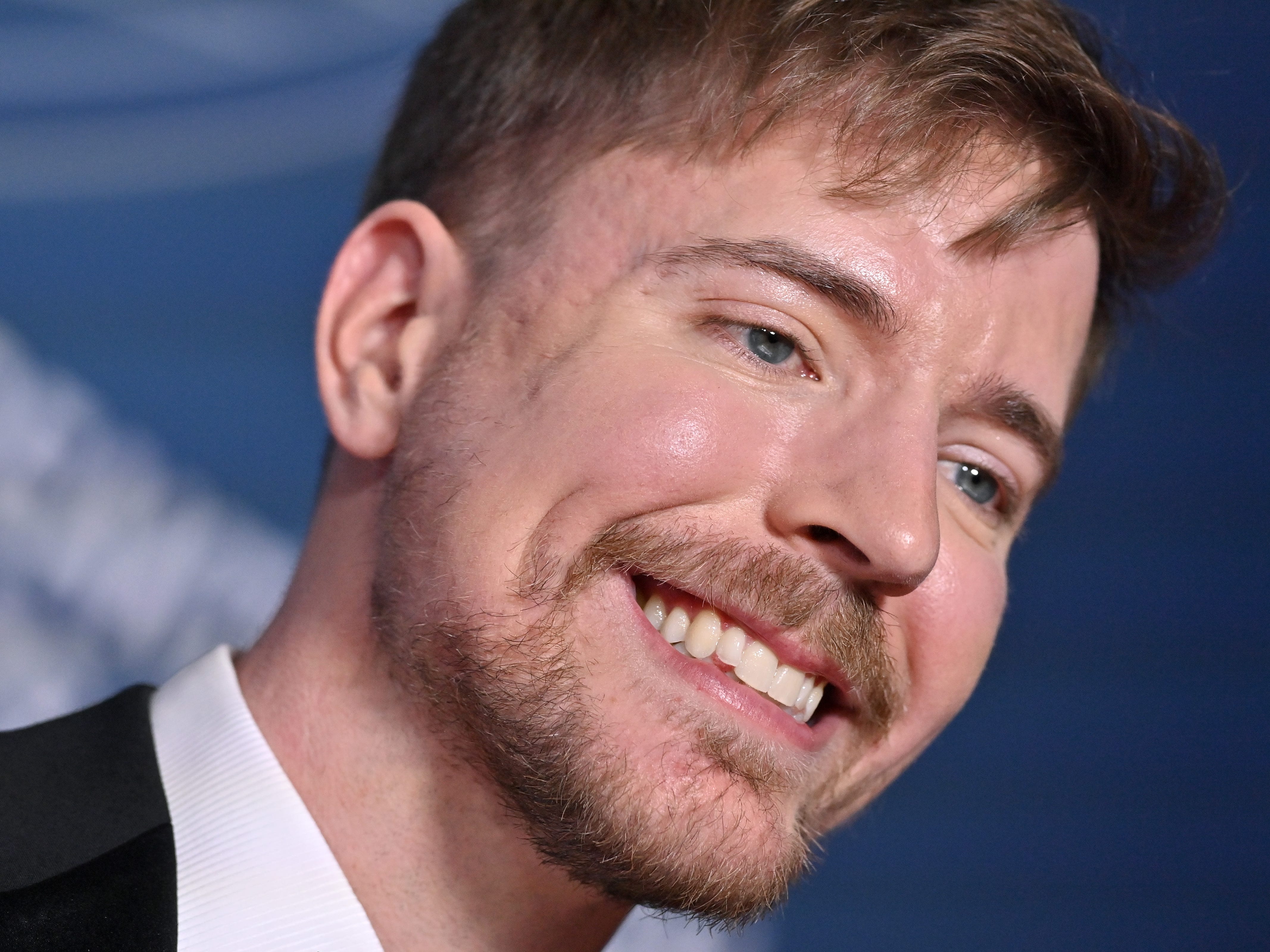 MrBeast smiling on the red carpet of the Breakthrough Prize.