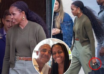 Michelle Obama flashes her wedding ring after shutting down Barack divorce rumors once and for all