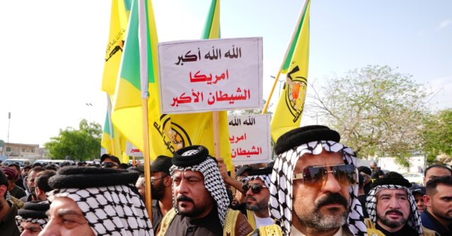 Report: Iran-Backed Militias in Iraq Open to Disarming to Avoid Trump Airstrikes