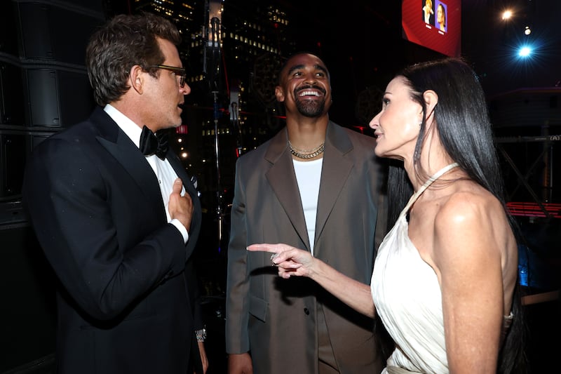 NEW YORK, NEW YORK - APRIL 24: (L-R) Ryan Reynolds, Demi Moore and Jalen Hurts attend the 2025 TIME100 Gala at Jazz at Lincoln Center on April 24, 2025 in New York City. (Photo by Kevin Mazur/Getty Images for TIME)