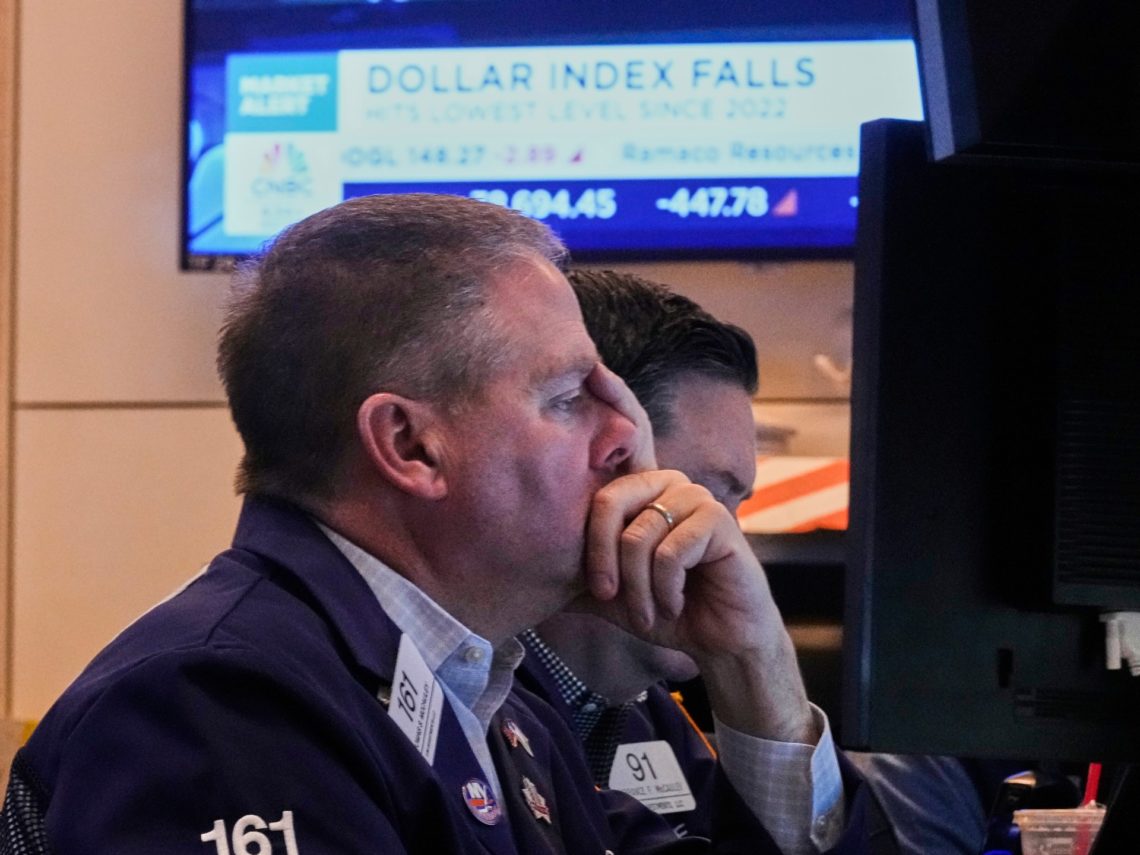 US stocks and dollar tumble as Trump renews attacks on Fed Chair Powell