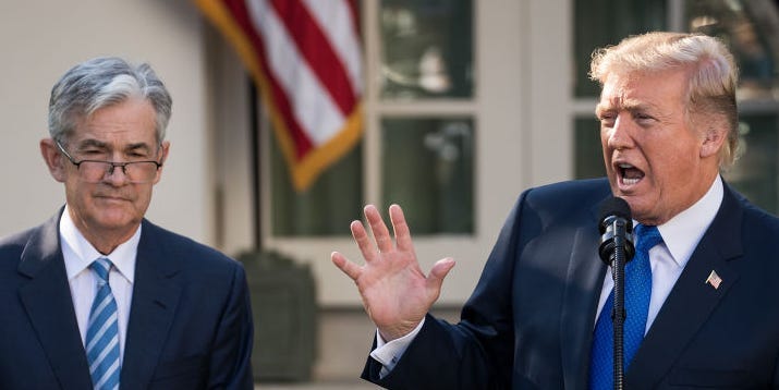 Trump speaking in front of the White House with Jerome Powell