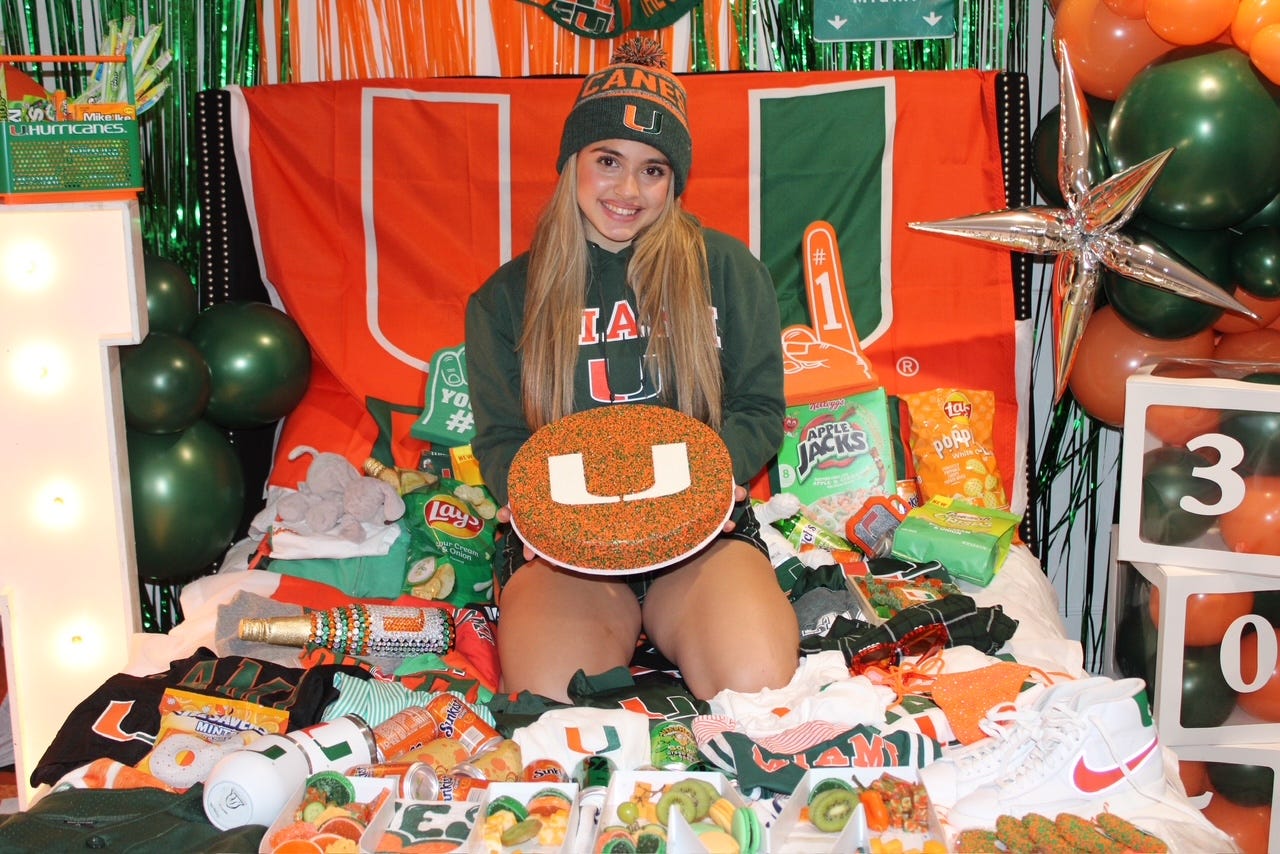 Sienna Long posing at her University of Miami bed party.