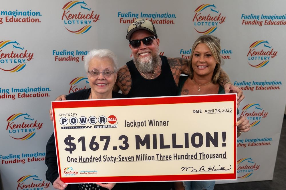 James Shannon Farthing poses with his mother Linda Grizzle after duo won the $167.3 million Powerball jackpot on April 26, 2025.