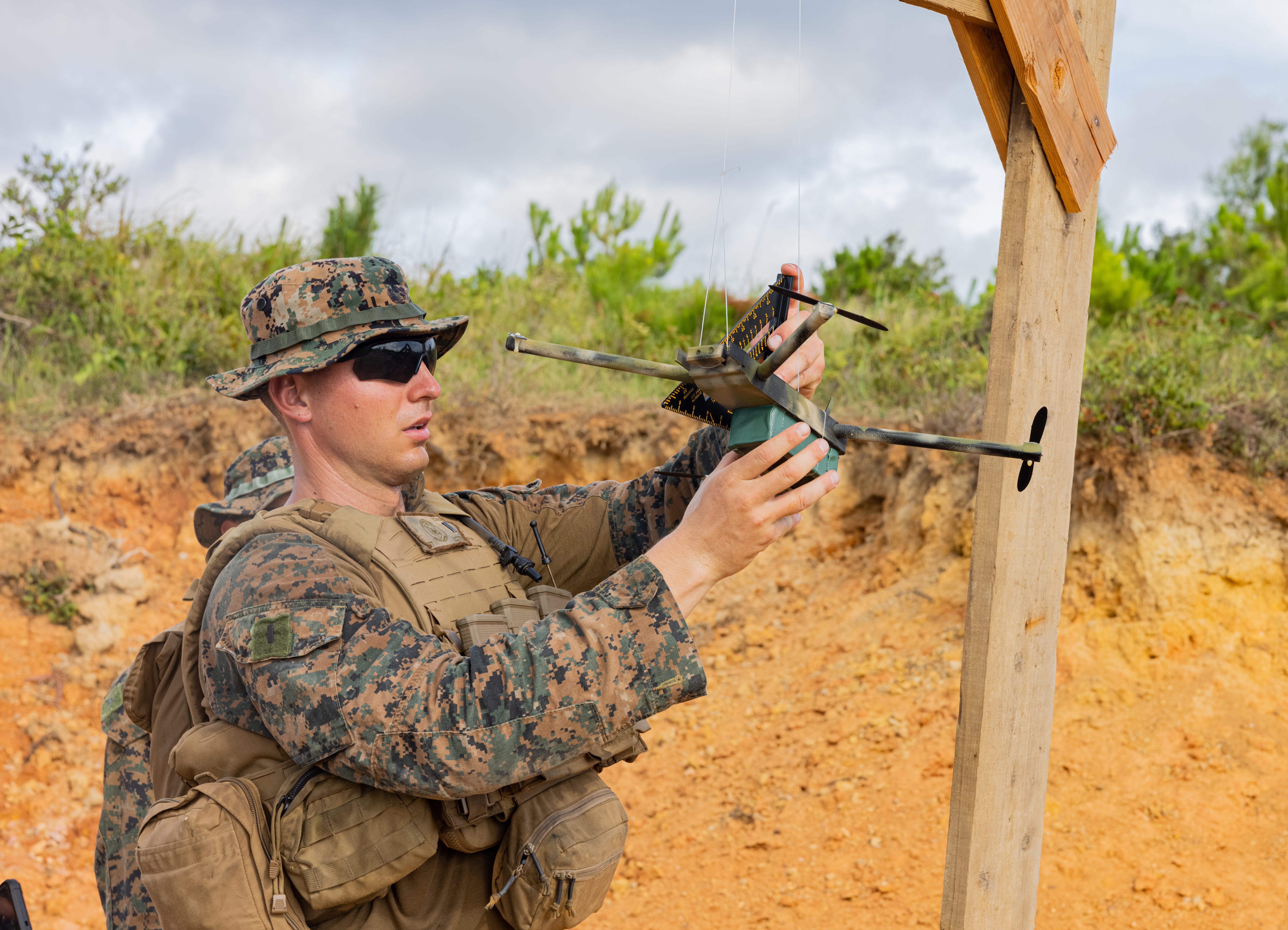 A US Marine readies a simulated drone target during a Counter-Small Unmanned Aircraft Systems range on Camp Hansen, Okinawa, Japan, July 12, 2024.