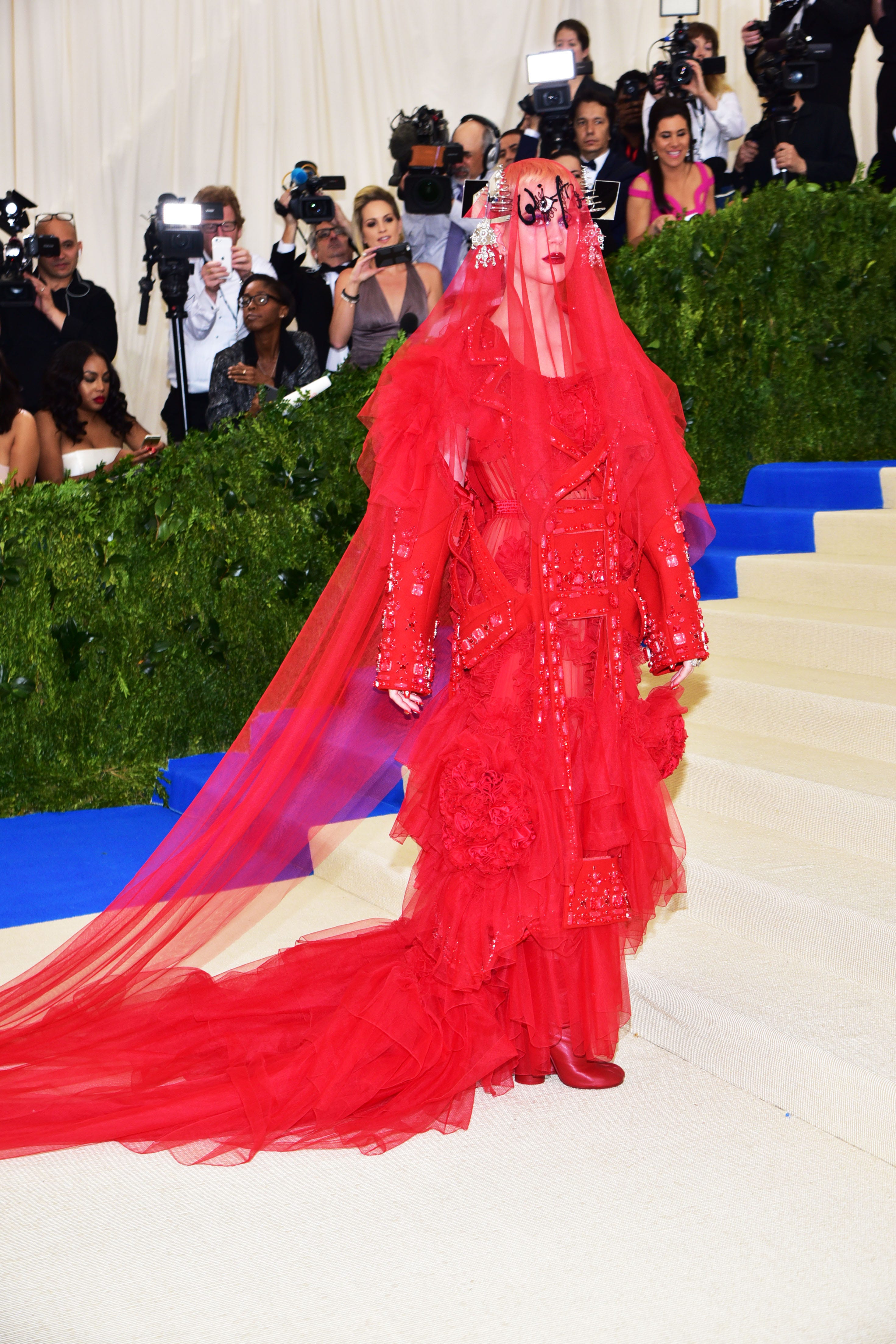 Katy Perry in a red tulle ensemble at the 2017 Met Gala