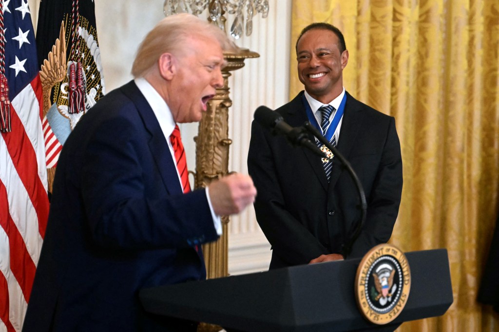 Tiger Woods and Donald Trump in February. 