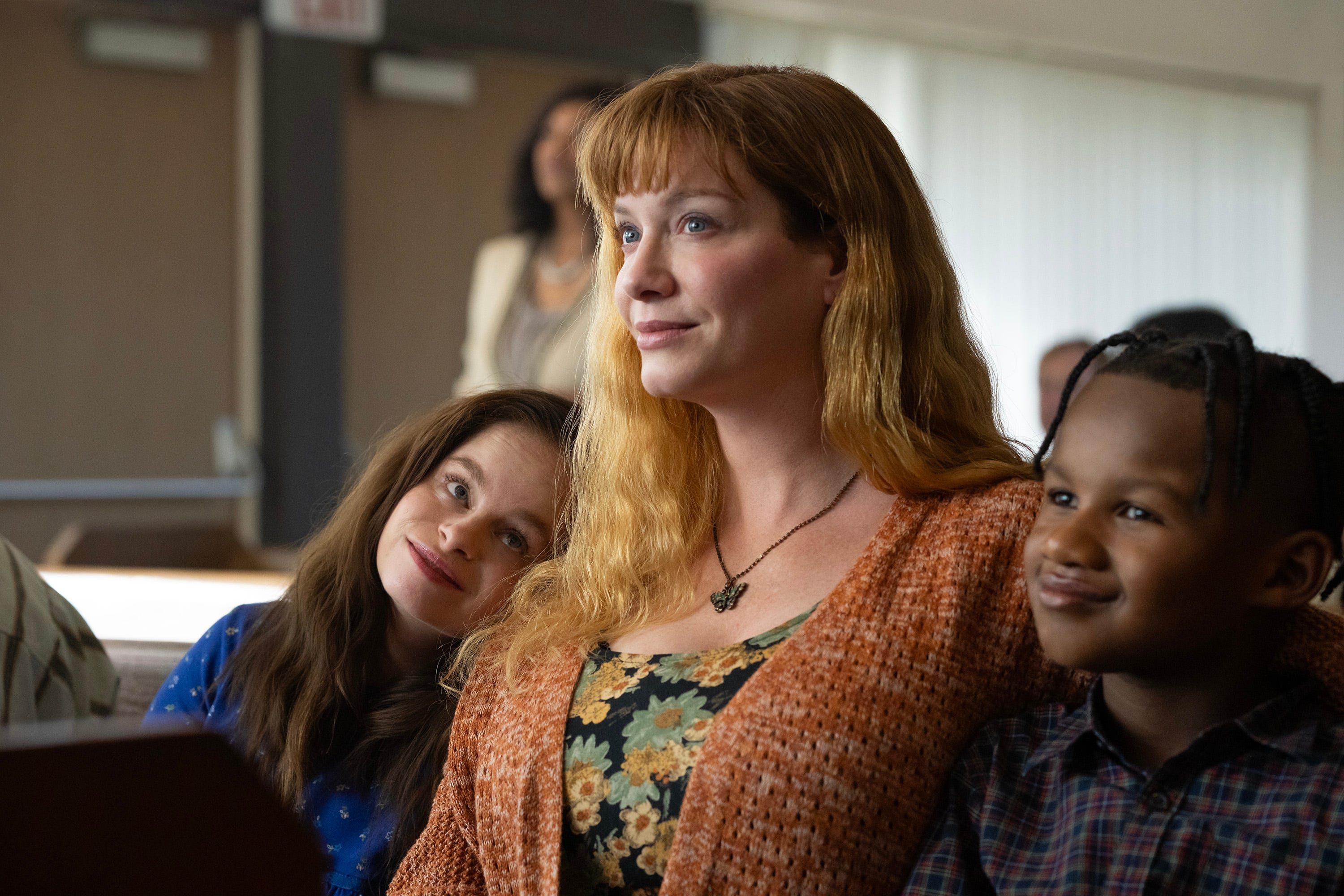 Imogen Faith Reid, Christina Hendricks, and Jahaan Ebanks in "Good American Family."