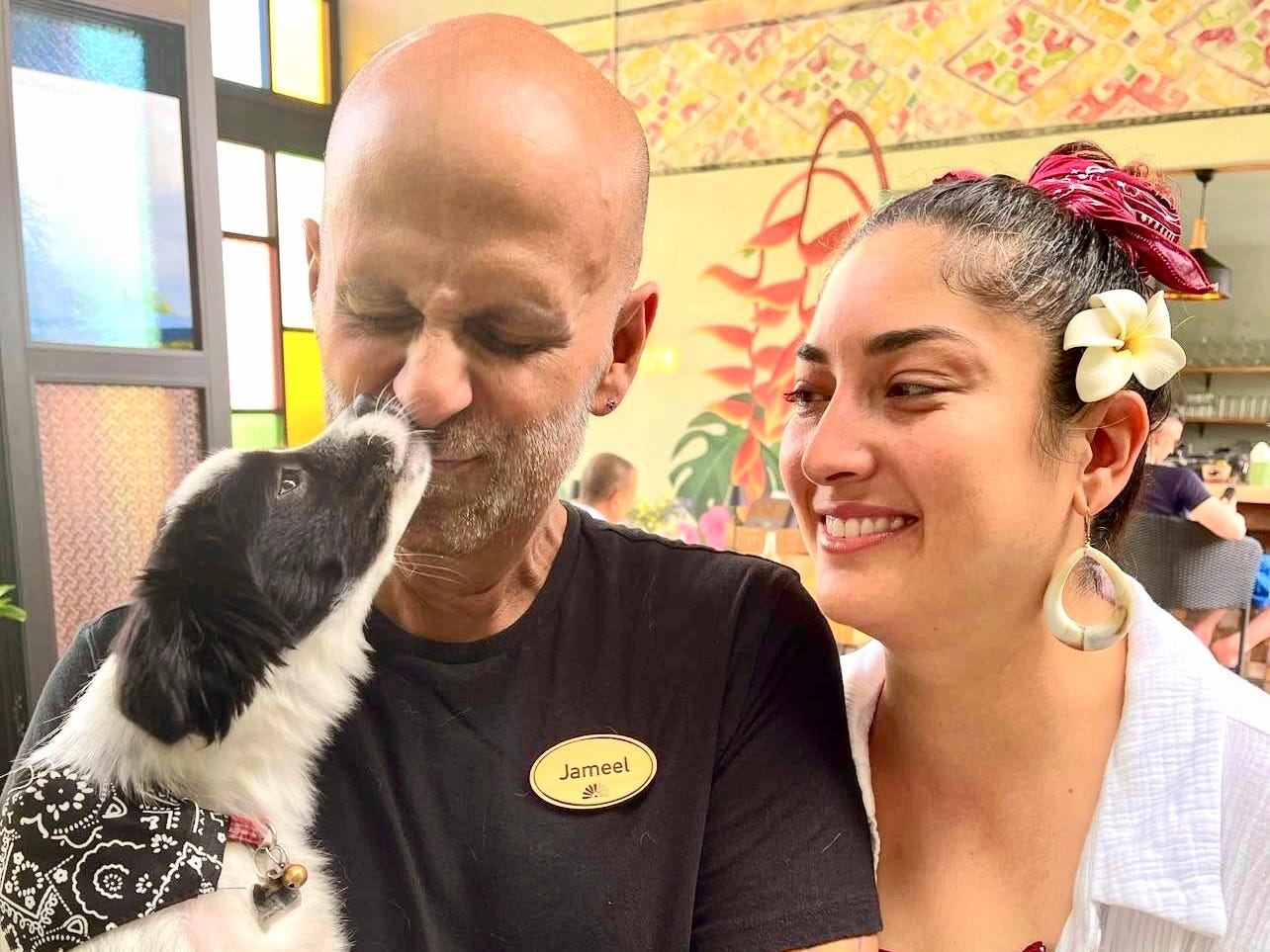 A couple and their dog.