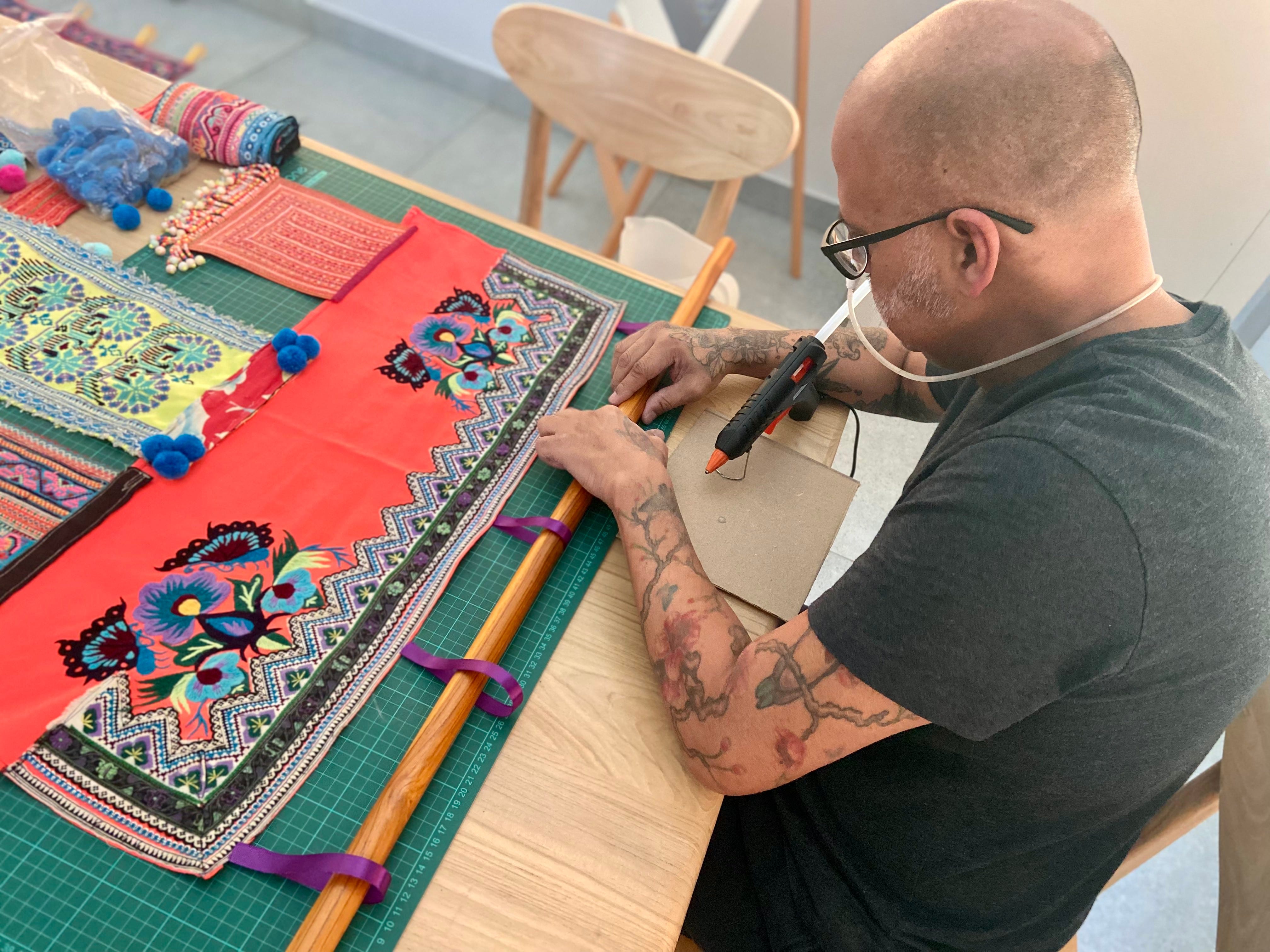 Jameel working on his art.