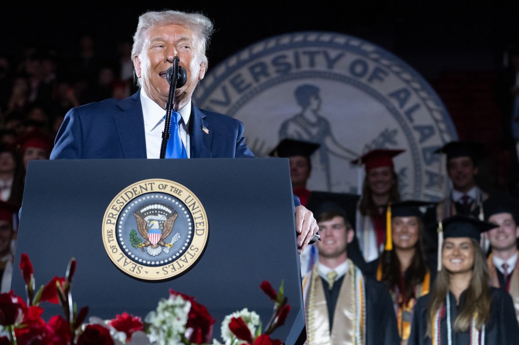 US President Donald Trump delivers commencement remarks at the University of Alabama in Tuscaloosa, Alabama.