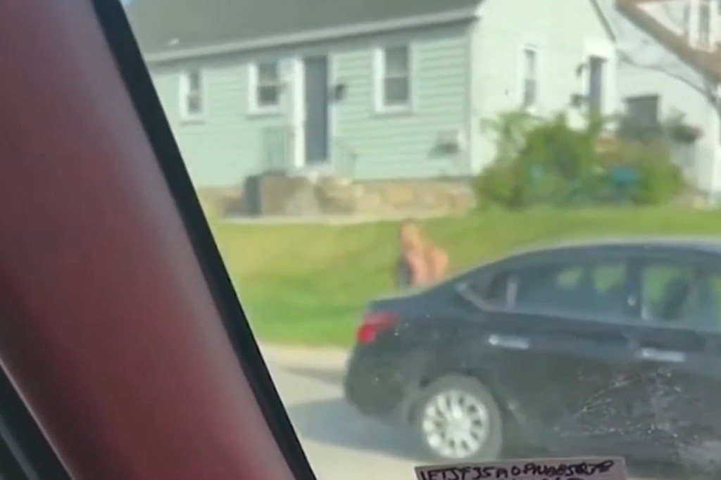 The footage shows a woman hop out of her vehicle, storm over to the other car, pull down her pants and squat on the grill of the other car -- quickly ripping loose in just a matter of seconds as the other driver honked.
