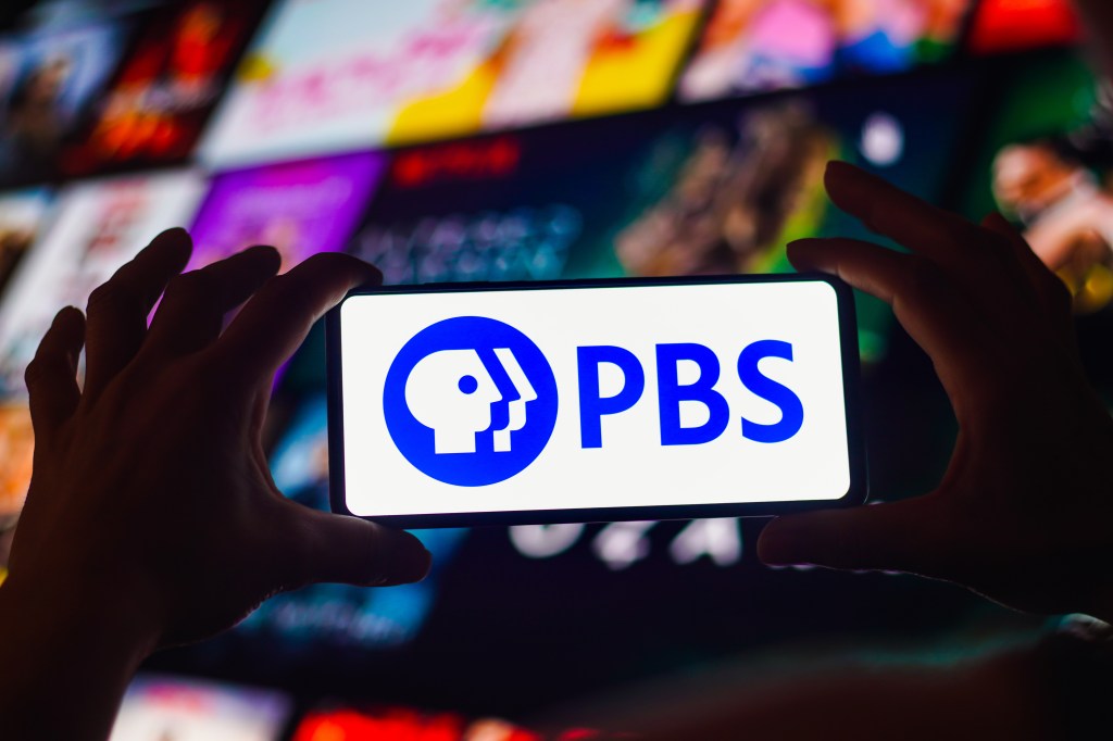the Public Broadcasting Service (PBS) logo is displayed on a smartphone screen