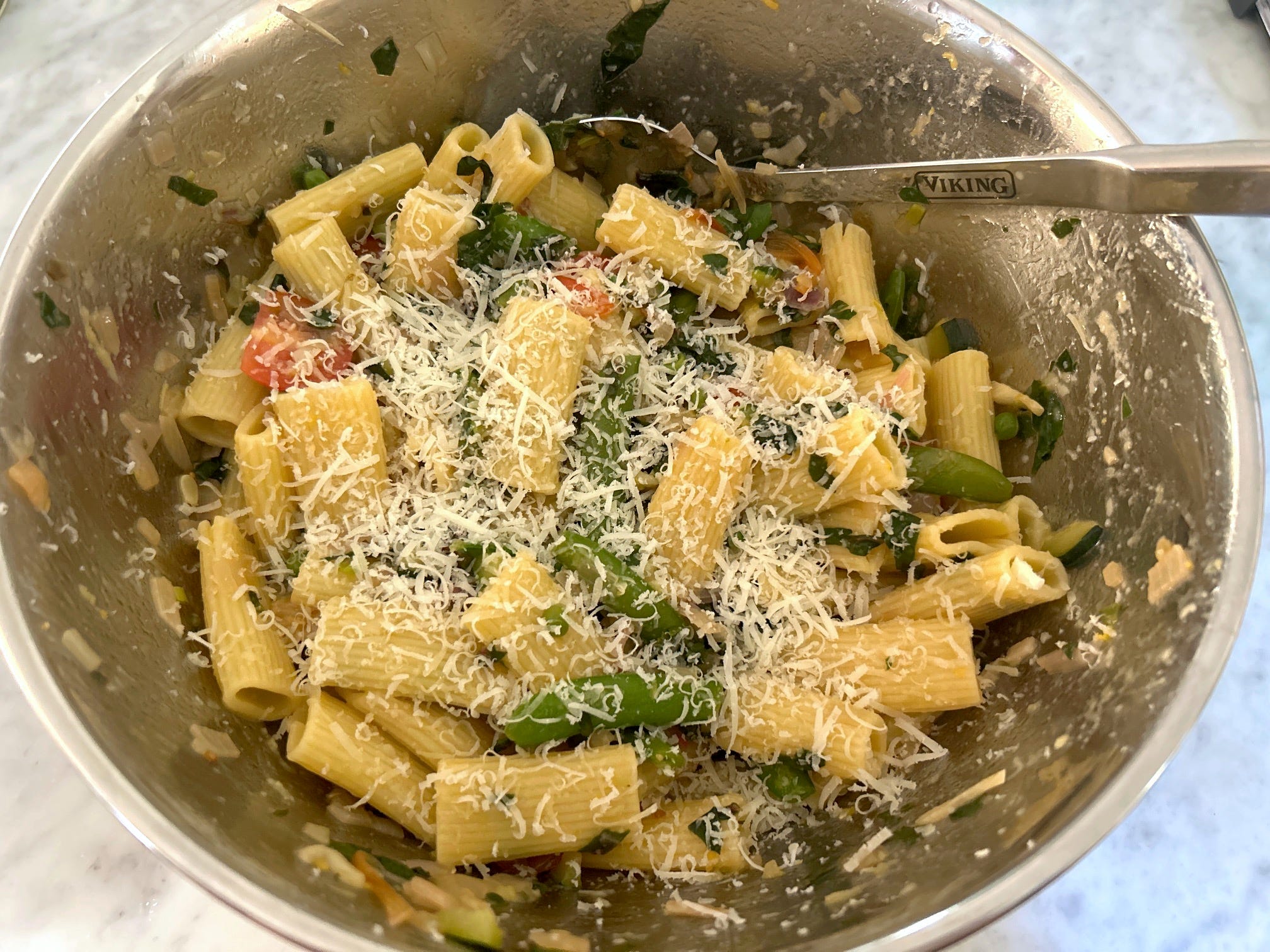 Mixing Meghan Markle's spring garden pasta salad