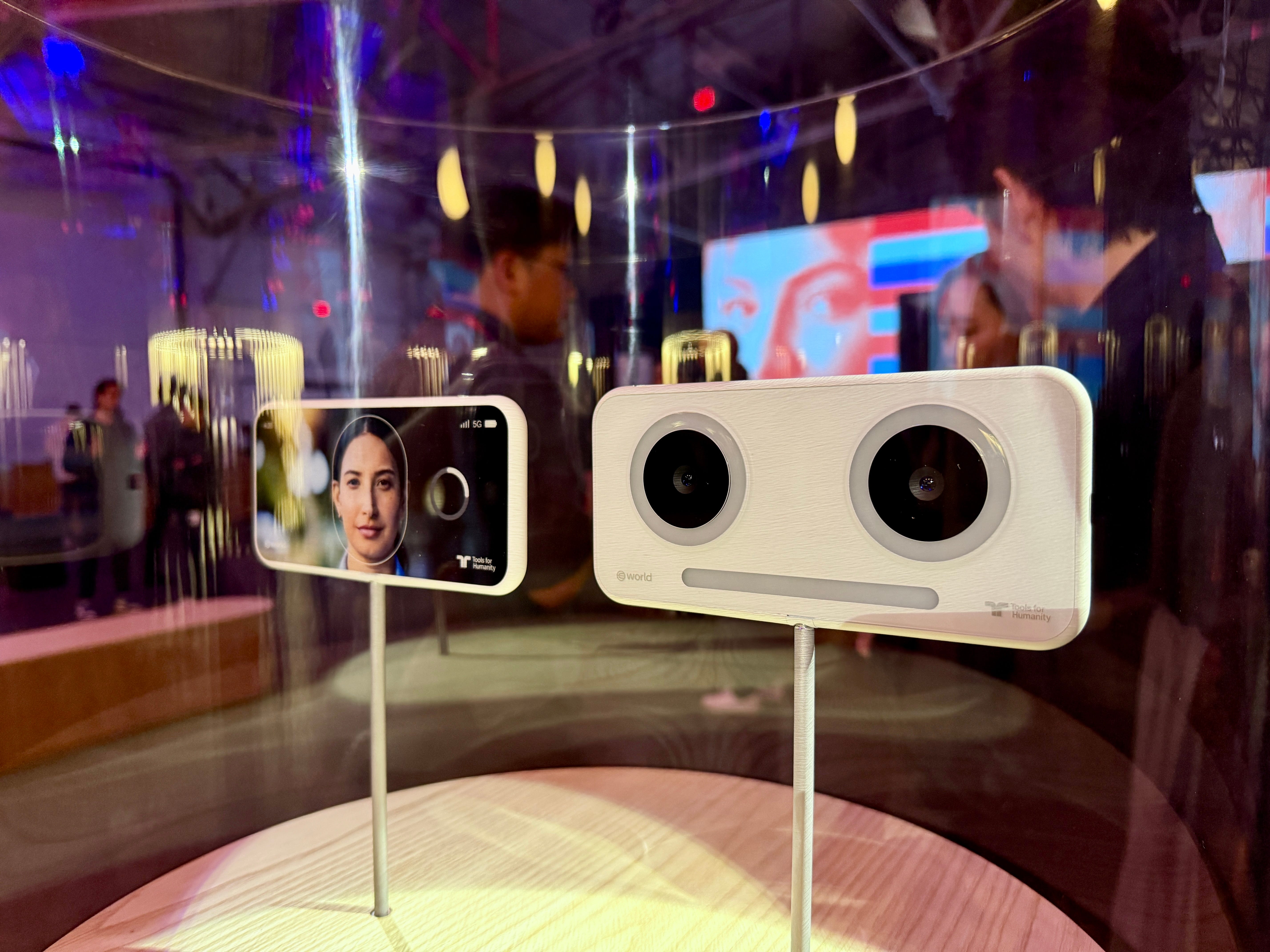 Two white devices that look like a smartphone.