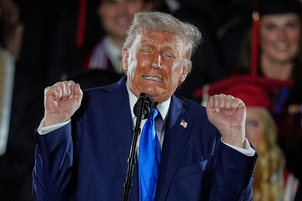 President Donald Trump makes a face as he shows off his impression.