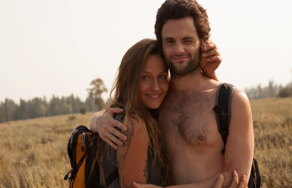 Penn Badgley and Domino Kirke on a hike.