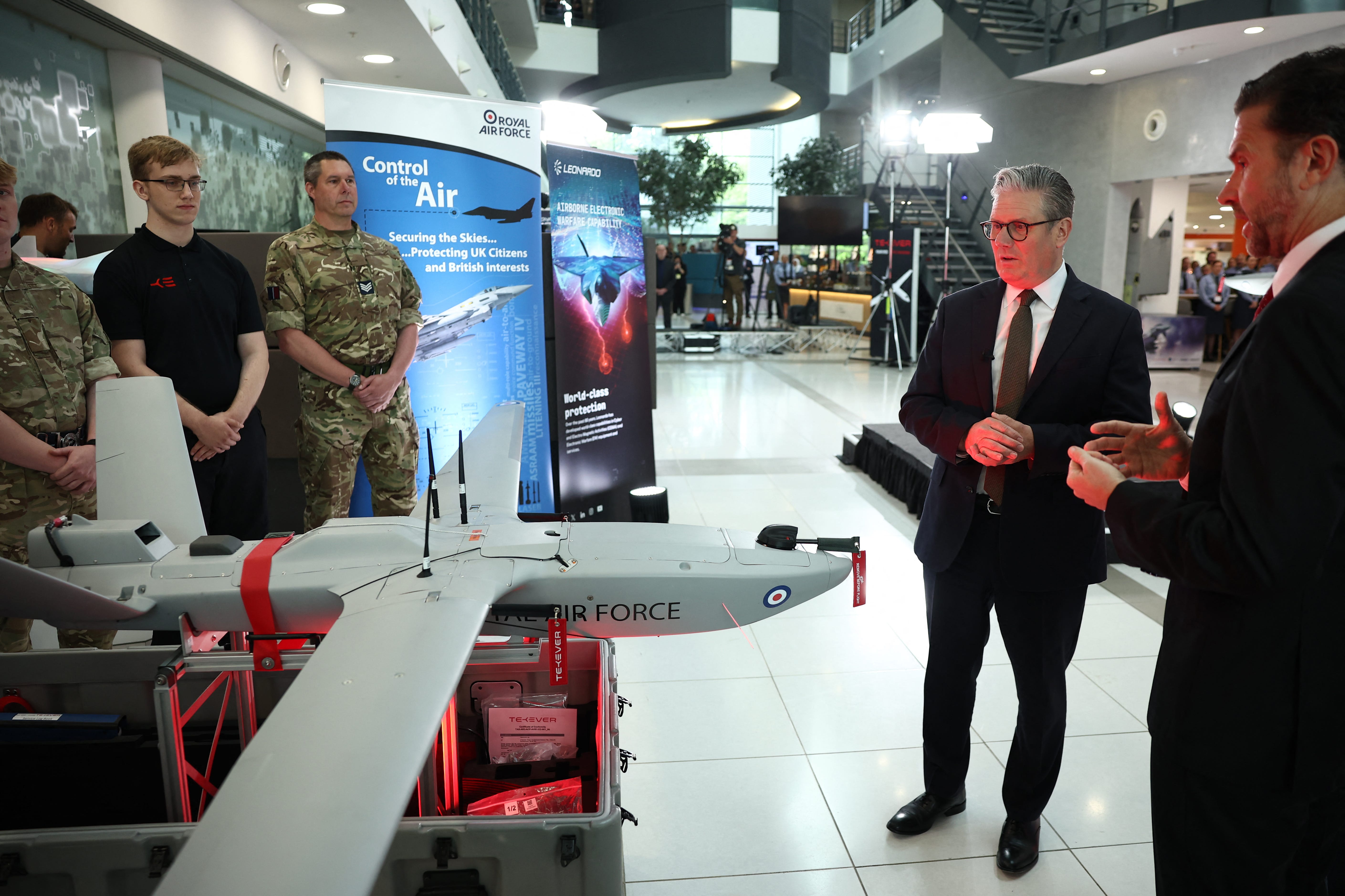 Britain's Prime Minister Keir Starmer stands next to the StormShroud drone on May 2.