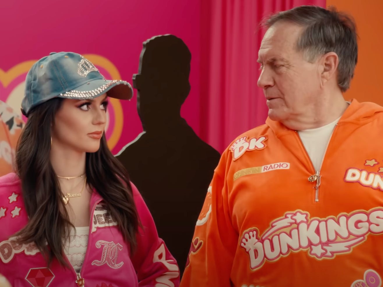 Bill Belichick and Jordon Hudson on the 2024 Dunkin' Super Bowl commercial.