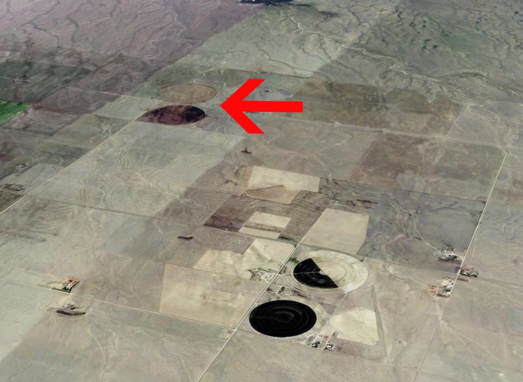 Analysis of Google Maps appears to show two irrigation circles that could be mistaken for a UFO and its shadow.