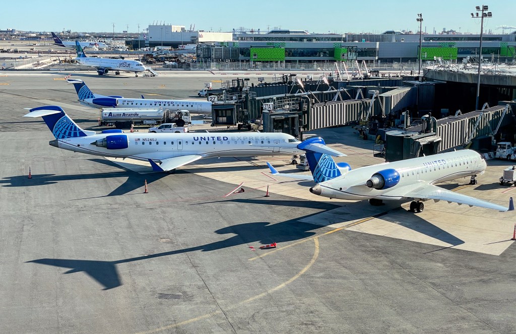 United Express airplanes parked at gates at Newark International Airport.