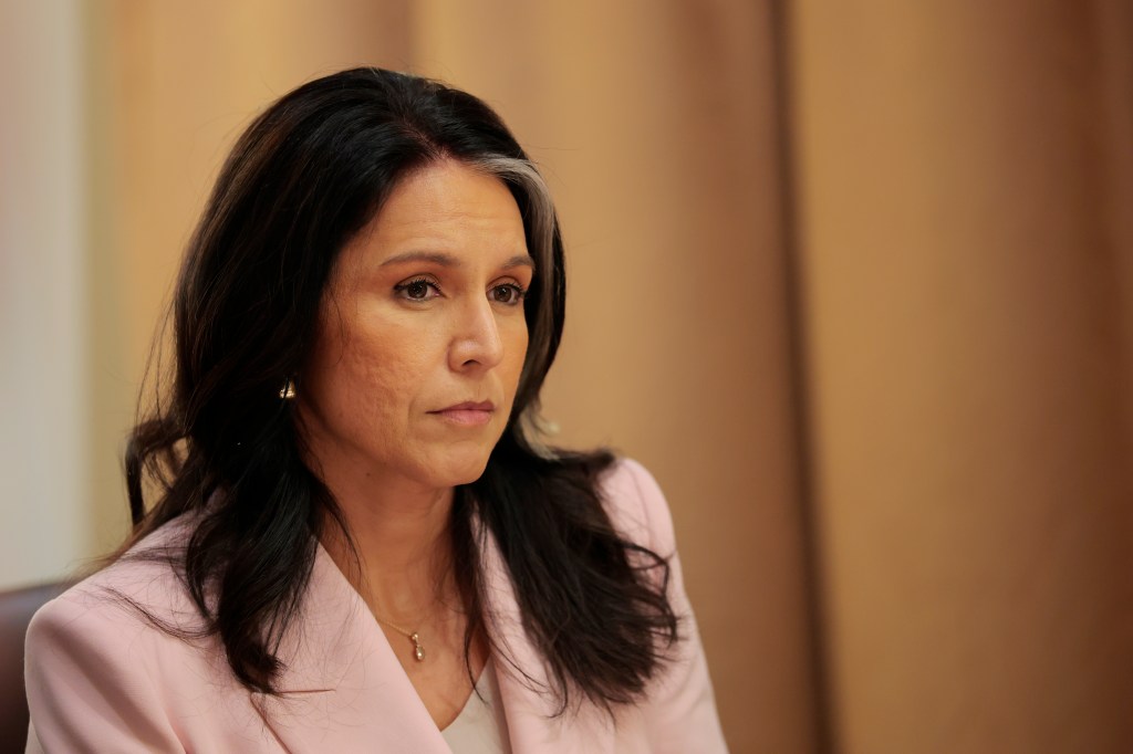 Director of National Intelligence Tulsi Gabbard sits during a Cabinet meeting at the White House on April 10, 2025. 