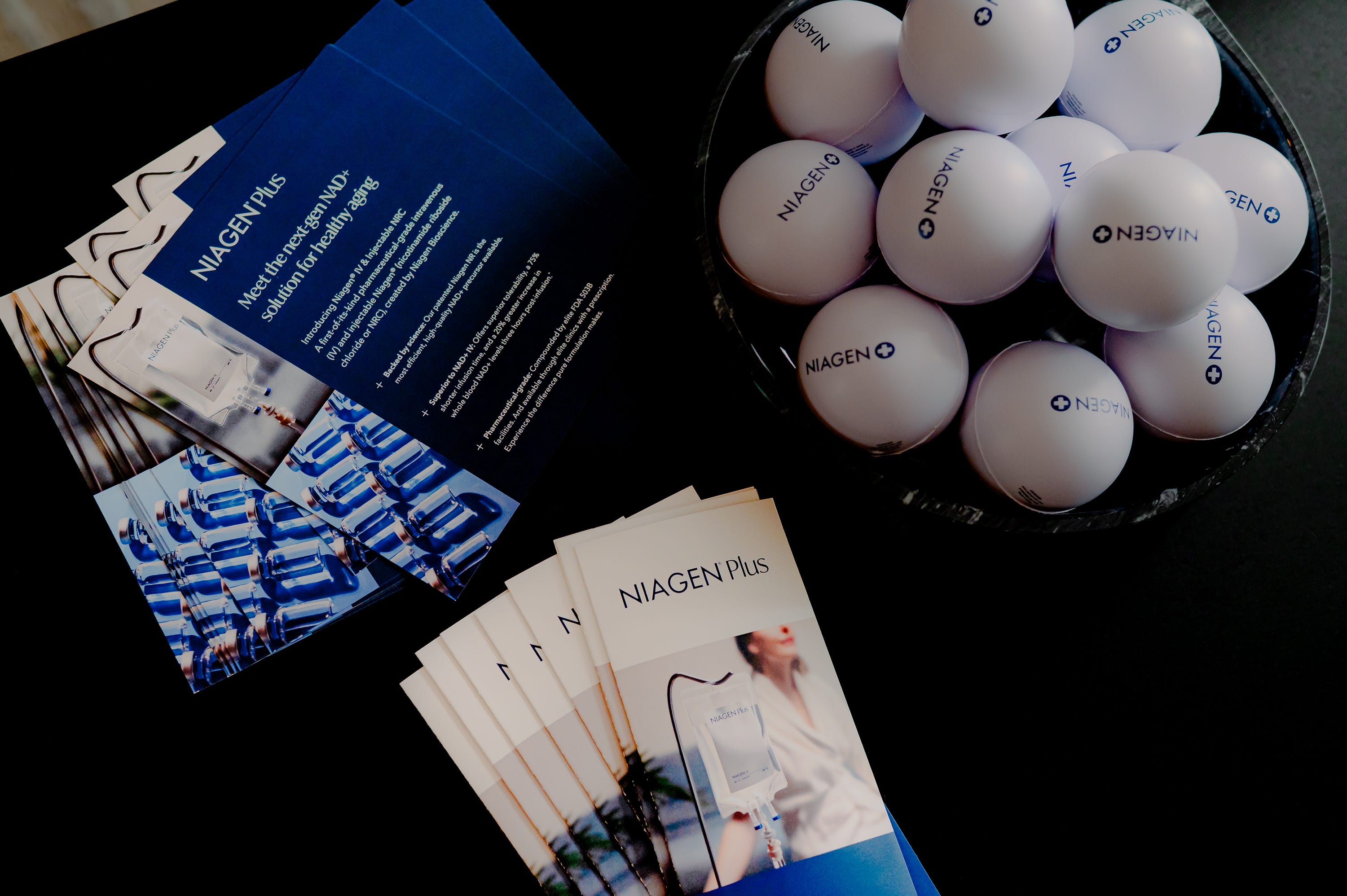 Products and brochures displayed on a table of Niagen Plus.